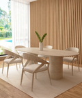 Elena – Table à manger ovale en travertin naturel avec base cylindrique lisse-Galerie Pietra