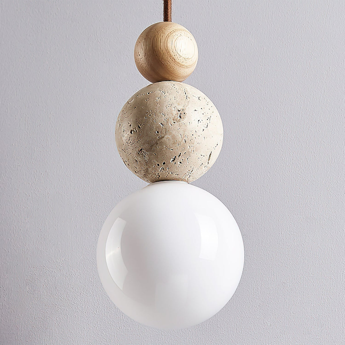 Sphera – Suspension sphérique en travertin naturel-Galerie Pietra