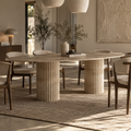 Veyla – Table à manger elliptique en travertin naturel avec piètement rainuré-Galerie Pietra